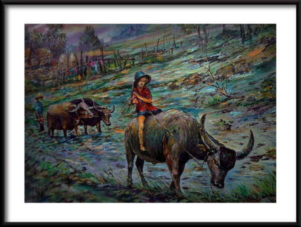 Bébé sur un buffle