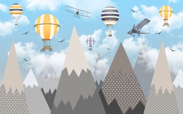 Ballons peints en papier coloré au-dessus des montagnes